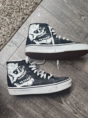 Vans Black High-Top Sneakers with White Skull Graphic